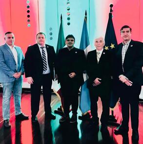 Dennis Casco with Italian Senator Mario Borghese during an institutional MAIE meeting